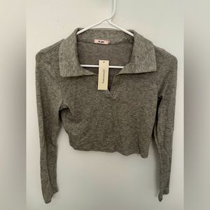 Gray cropped top. Never been worn with tags new